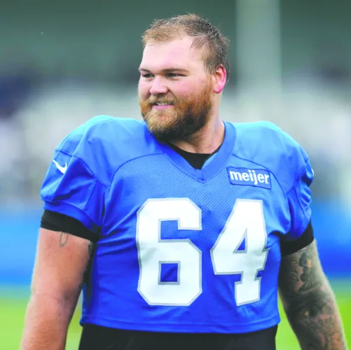 Lions center May out with freak injury, backup QB signed